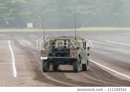A traveling Japan Ground Self-Defense Force medium-range multipurpose guided missile launcher A traveling Japan Ground Self-Defense Force medium-range multipurpose guided missile launcher 111289562