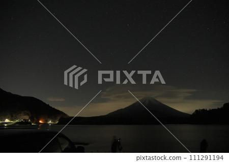 Mt. Fuji towering under the starry sky Mt. Fuji towering under the starry sky 111291194