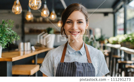 A young Western female clerk working at a cafe A young Western female clerk working at a cafe 111291273