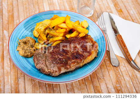 Appetizing beef entrecote with french fries 111294336