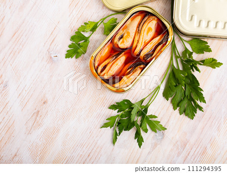 Pickled mussels in oil with parsley Pickled mussels in oil with parsley 111294395