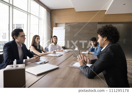 Multiethnic team of young colleagues brainstorming on creative ideas 111295178