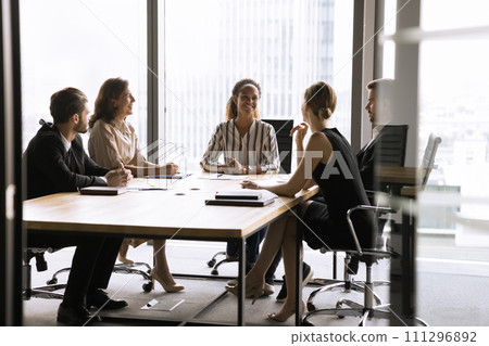 Happy young African American business leader woman holding brainstorming meeting 111296892