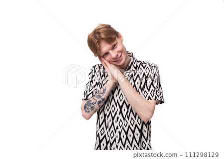 young red-haired caucasian man in short sleeve summer shirt is feeling sad 111298129