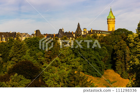 Building of Luxembourg Bank Spuerkeess behind trees Building of Luxembourg Bank Spuerkeess behind trees 111298336