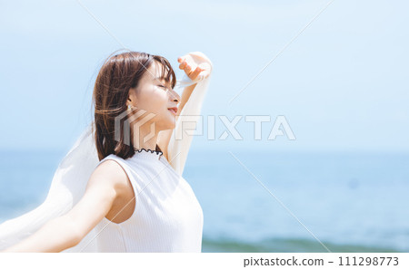 A woman with a white cloth A woman with a white cloth 111298773