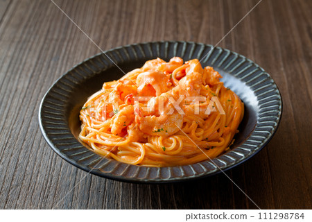 Prawn tomato cream pasta 111298784