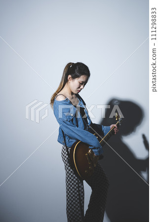 Female guitarist Female guitarist 111298833