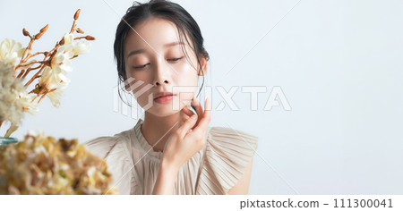 Beauty image of a woman with natural makeup Beauty image of a woman with natural makeup 111300041