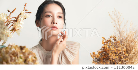 Beauty image of a woman with natural makeup Beauty image of a woman with natural makeup 111300042
