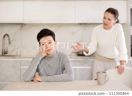 Mother and son arguing 111300864