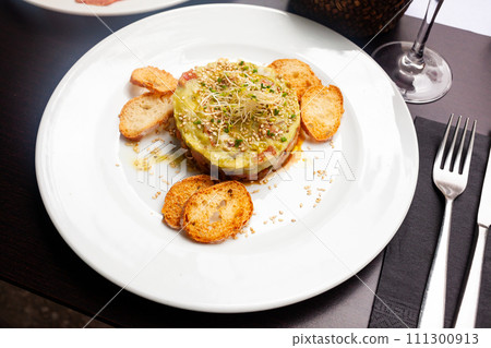 Delicious salmon tartare with guacamole Delicious salmon tartare with guacamole 111300913
