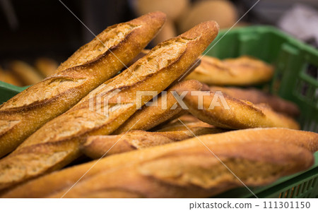 macro photo of white bread in baking tray in bakery macro photo of white bread in baking tray in bakery 111301150