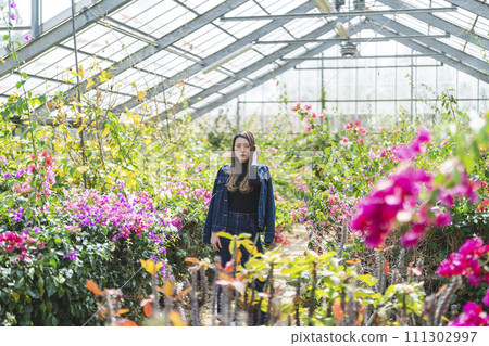 woman in botanical garden woman in botanical garden 111302997