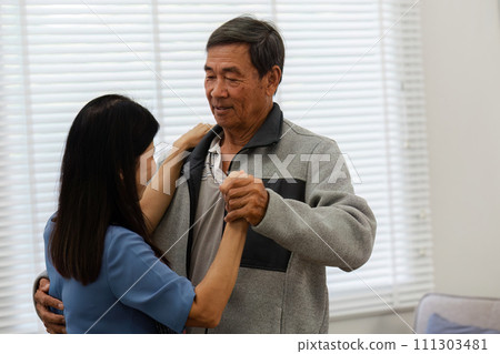 Holding hands, hug or happy old couple dancing for love, support or trust in marriage at home together 111303481
