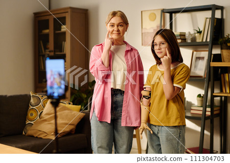 Family of bloggers during livestream 111304703