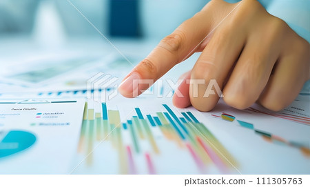business woman hand working with financial charts 111305763