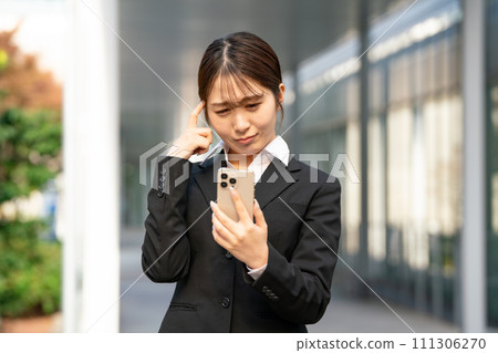 Young woman business smartphone 111306270