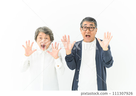 Senior couple surprised surprised Senior couple surprised surprised 111307926