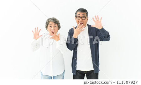 Senior couple surprised surprised Senior couple surprised surprised 111307927