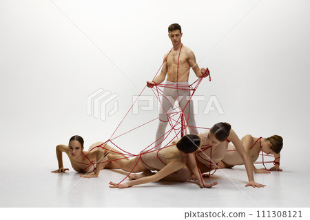 against white studio background 111308121