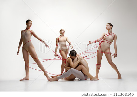 against white studio background 111308140