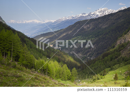 Ganter Bridge in the valley in de distance in Valais, Switzerland 111310359