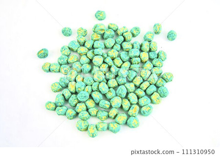 Dried pea seeds ready to plant. Close-up on a white background 111310950