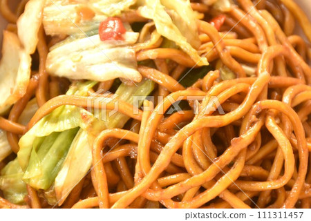 fried yakisoba Japanese noodles and cabbage in spicy sauce on bowl  111311457