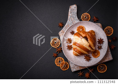 Delicious crispy sweet croissant cornet with chocolate Delicious crispy sweet croissant cornet with chocolate 111312548