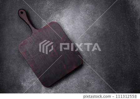 Empty wooden cutting board on a light texture background Empty wooden cutting board on a light texture background 111312558