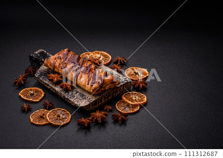 Delicious crispy sweet puff pastry with chocolate and salted caramel Delicious crispy sweet puff pastry with chocolate and salted caramel 111312687