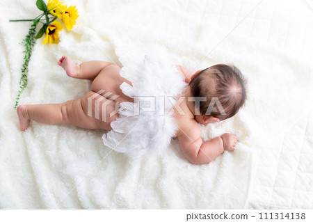 Close-up of a 4 month old infant Newborn photo Close-up of a 4 month old infant Newborn photo 111314138