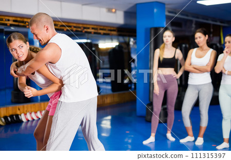 Woman training elbow strike 111315397