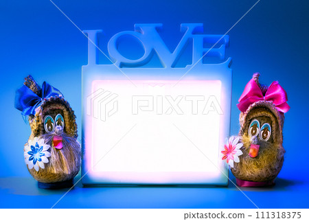 Two funny gnomes and love frame on a blue background 111318375