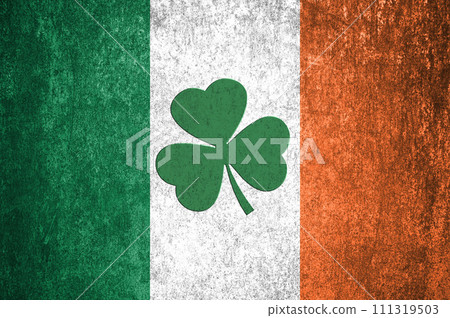 St. Patrick's Day background. Shamrocks against the background of the Irish flag. Decoration for St. Patrick's Day. 111319503