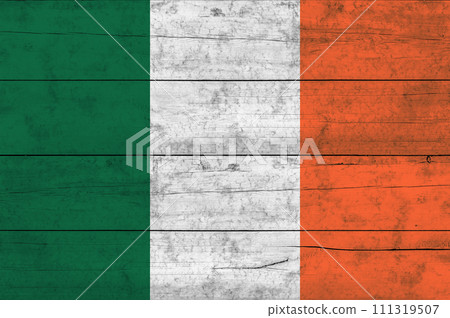 Ireland flag on a wooden surface. Banner of the grunge Ireland flag. Ireland flag on a wooden surface. Banner of the grunge Ireland flag. 111319507