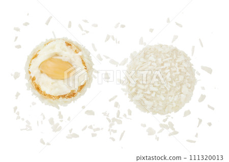 round candy raffaello with coconut flakes and nut isolated on white background. Top view. Flat lay. 111320013