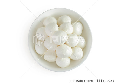 Mini mozzarella balls in a ceramic bowl isolated on white background with full depth of field. Top view. Flat lay. 111320035