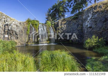 Waterfall Cascade des Veyrines near Allanche in French highlands, Auvergne, Cantal, France Waterfall Cascade des Veyrines near Allanche in French highlands, Auvergne, Cantal, France 111321349