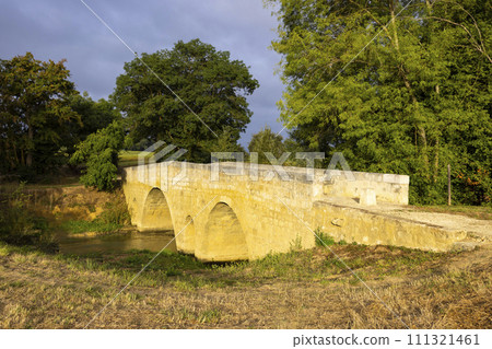 Romanesque bridge of Artigue and river Osse near Larressingle on route to Santiago de Compostela, UNESCO World Heritage Site, departement Gers, France Romanesque bridge of Artigue and river Osse near Larressingle on route to Santiago de Compostela, UNESCO World Heritage Site, departement Gers, France 111321461