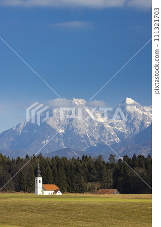 Landscape with church near Kranj, Slovenia 111321703