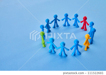 Diversity and inclusion concept. Colorful figurines on blue background Diversity and inclusion concept. Colorful figurines on blue background 111322681