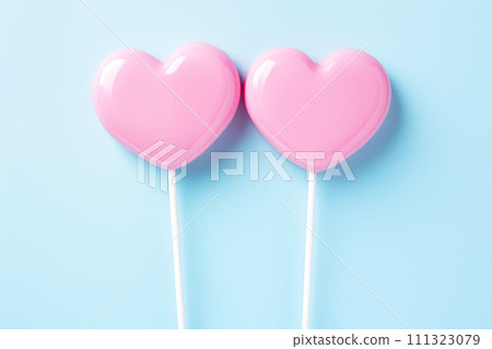 AI-generated content. Two pink heart-shaped lollipops on blue. AI-generated content. Two pink heart-shaped lollipops on blue. 111323079