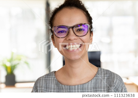 Profile picture of smiling African American woman employee Profile picture of smiling African American woman employee 111323638
