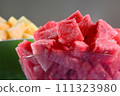 Cut slices of watermelon in glass plate. 111323980