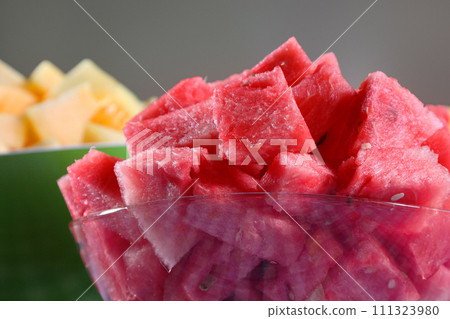 Cut slices of watermelon in glass plate. Cut slices of watermelon in glass plate. 111323980