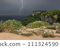 Thunderstorm is approaching over plateau of Crimean mountains. The dividing line of solar weather and stormy weather in Crimea. 111324590