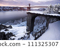 Old buildings and big bridges covered in snow - Generative AI 111325307