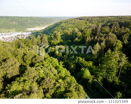 bird view over the forest into the landscape in Germany 111325349